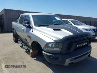 2016 Ram 1500 Rebel z VIN 1C6RR7YT5GS251994, wystawiony jako IAAI lot #42139378 z przebiegiem 102 736 mil mil oraz . Historia ofert i sprzedaży dostępna na DreamBid. Obrazek 6.