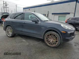 2017 Porsche Cayenne S E-Hybrid with VIN WP1AE2A27HLA74235, listed as a Copart auction lot 49437265 with 154,808 mi miles and Salvage title. Bid and sale history available at DreamBid. Image 4.