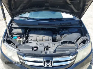 2015 Honda Odyssey EX-L z VIN 5FNRL5H63FB019446, wystawiony jako IAAI lot #42566992 z przebiegiem 243 248 mil mil oraz . Historia ofert i sprzedaży dostępna na DreamBid. Obrazek 10.