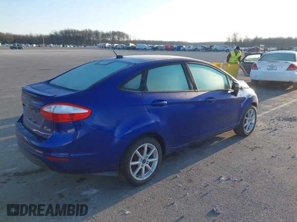 2014 Ford Fiesta SE z VIN 3FADP4BJ5EM243551, wystawiony jako IAAI lot #41919239 z przebiegiem 92 396 mil mil oraz . Historia ofert i sprzedaży dostępna na DreamBid. Obrazek 4.