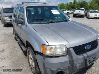 2003 Ford Escape XLS Popular with VIN 1FMYU02183KC05213, listed as a IAAI auction lot 41955134 with 305,524 mi miles. Bid and sale history available at carsss.com. Image 6.