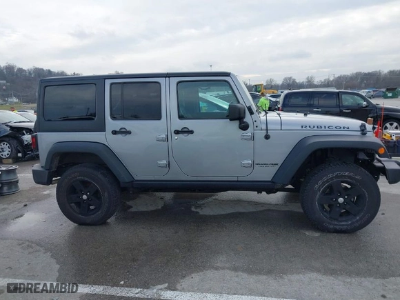 2018 Jeep Wrangler JK Unlimited Rubicon with VIN 1C4BJWFG0JL851583, listed as a IAAI auction lot 41175090 with 139,711 mi miles. Bid and sale history available at carsss.com. Image 14.