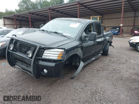 2007 Nissan Titan SE with VIN 1N6BA07A17N212890, listed as a IAAI auction lot 41034412 with 211,881 mi miles and . Bid and sale history available at DreamBid. Image 6.