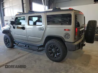 2003 Hummer H2 with VIN 5GRGN23U73H142618, listed as a Copart auction lot 89116505 with 28,597 mi miles and Salvage Title. Bid and sale history available at carsss.com. Image 2.