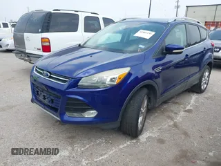 2014 Ford Escape Titanium с VIN 1FMCU0J96EUA61153, выставлен на аукционе IAAI как лот 41807295 с пробегом 159 036 миль миль и . История ставок и продаж доступна на DreamBid. Изображение 2.