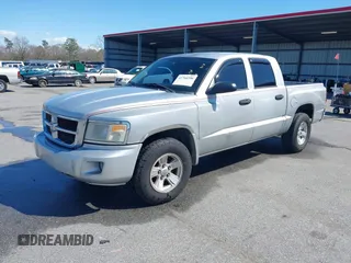 2008 Dodge Dakota SLT with VIN 1D7HE48K78S514290, listed as a IAAI auction lot 41766396 with 208,744 mi miles and . Bid and sale history available at carsss.com. Image 2.