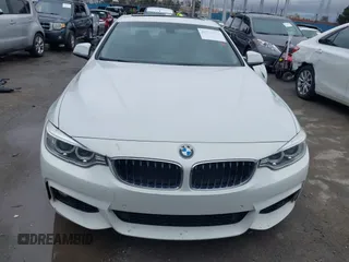 2015 BMW 4 Series 428i with VIN WBA3N7C58FK222925, listed as a IAAI auction lot 41776858 with 106,946 mi miles and . Bid and sale history available at carsss.com. Image 12.