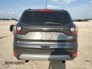 2017 Ford Escape SE with VIN 1FMCU0GD7HUD93215, listed as a Copart auction lot 54966295 with 153,704 mi miles and Salvage Title. Bid and sale history available at DreamBid. Image 6.