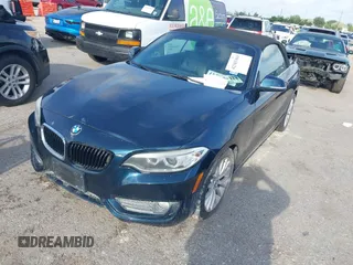 2015 BMW 2 Series 228i with VIN WBA1K5C58FV473737, listed as a IAAI auction lot 42383363 with Not provided miles and . Bid and sale history available at DreamBid. Image 2.