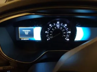 2014 Ford Fusion Titanium Hybrid with VIN 3FA6P0RUXER355654, listed as a IAAI auction lot 41611653 with 211,353 mi miles. Bid and sale history available at carsss.com. Image 7.