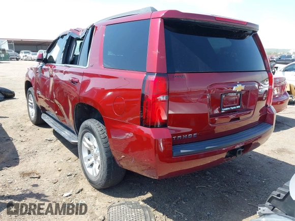 2018 Chevrolet Tahoe LT with VIN 1GNSKBKC6JR215585, listed as a IAAI auction lot 42043898 with 85,730 mi miles and . Bid and sale history available at DreamBid. Image 3.