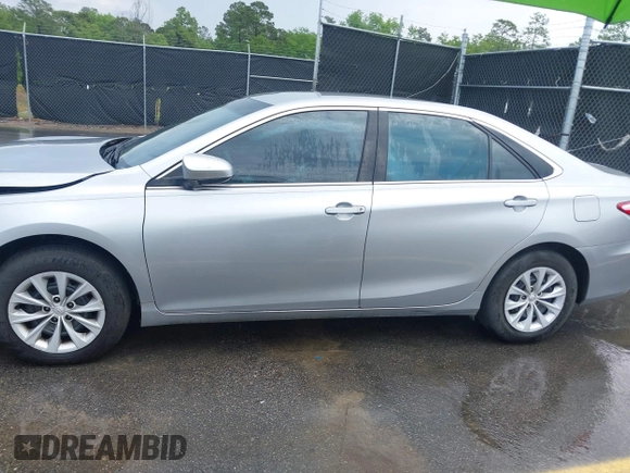 2015 Toyota Camry XLE with VIN 4T4BF1FK4FR483890, listed as a IAAI auction lot 42088503 with 189,058 mi miles and . Bid and sale history available at DreamBid. Image 14.