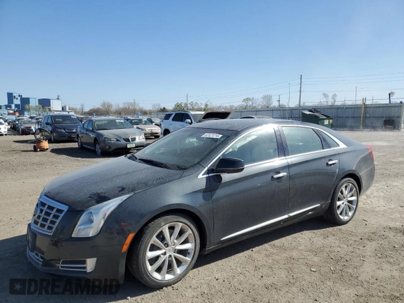 2013 Cadillac XTS Luxury with VIN 2G61R5S32D9167358, listed as a Copart auction lot 53121215 with 81,535 mi miles and Salvage title. Bid and sale history available at DreamBid. Image 1.