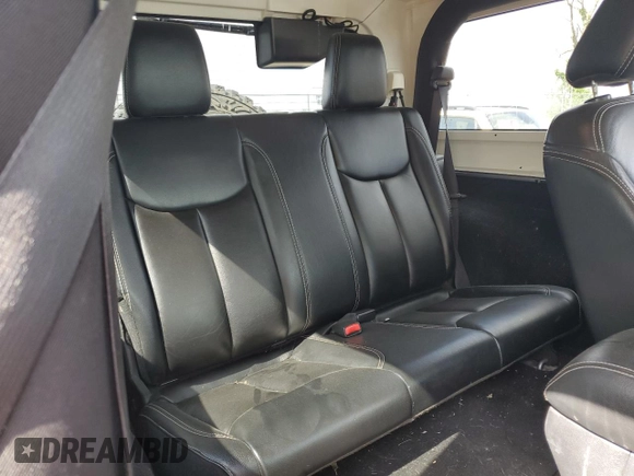 2014 Jeep Wrangler Sahara with VIN 1C4AJWBG0EL241643, listed as a Copart auction lot 56491155 with 113,596 mi miles and Salvage title. Bid and sale history available at DreamBid. Image 10.