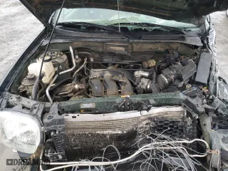 2003 Ford Escape XLS Popular with VIN 1FMYU021X3KA70123, listed as a Copart auction lot 86005514 with 0 mi miles and Salvage Title. Bid and sale history available at carsss.com. Image 11.