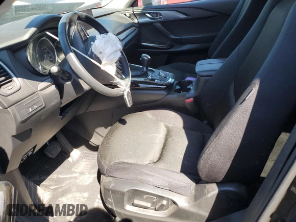 2021 Mazda CX-9 Sport with VIN JM3TCBBY9M0527244, listed as a Copart auction lot 64231384 with Not Provided miles and Salvage Title. Bid and sale history available at DreamBid. Image 7.