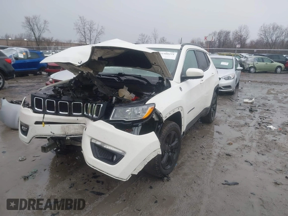 2019 Jeep Compass Latitude with VIN 3C4NJCBB4KT778018, listed as a IAAI auction lot 41900231 with 102,651 mi miles and . Bid and sale history available at carsss.com. Image 2.