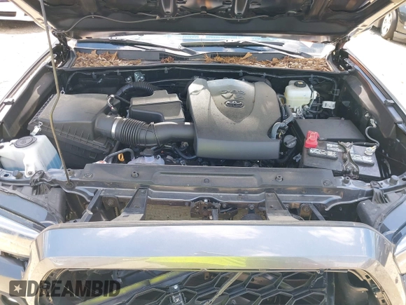 2023 Toyota Tacoma SR with VIN 3TMCZ5AN9PM553246, listed as a IAAI auction lot 42201812 with 20,907 mi miles and . Bid and sale history available at DreamBid. Image 10.