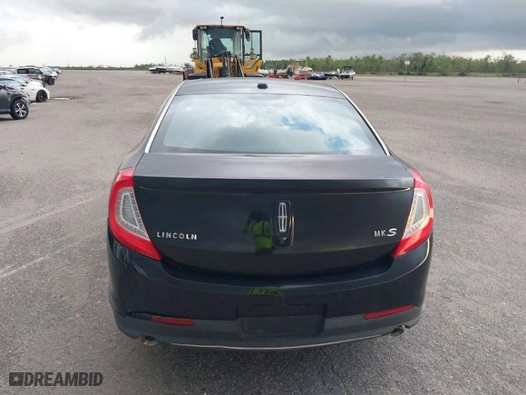 2013 Lincoln MKS with VIN 1LNHL9DK5DG601651, listed as a IAAI auction lot 40736486 with 265856 miles. Bid and sale history available at carsss.com. Image 16.