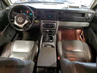 2007 Jeep Commander Sport z VIN 1J8HG48P17C547173, wystawiony jako Copart lot #58840465 z przebiegiem 169 135 mil mil oraz Nie do naprawy • Non repairable. Historia ofert i sprzedaży dostępna na DreamBid. Obrazek 8.