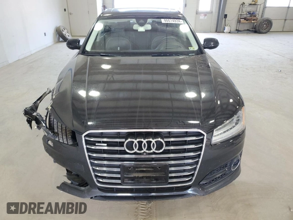 2016 Audi A8 Sport z VIN WAU43AFD1GN011589, wystawiony jako Copart lot #86614934 z przebiegiem 96 137 mil mil oraz Szkoda całkowita • Salvage title. Historia ofert i sprzedaży dostępna na DreamBid. Obrazek 5.