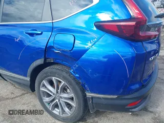2020 Honda CR-V Touring with VIN 7FARW2H91LE012284, listed as a IAAI auction lot 41672460 with 28,207 mi miles and . Bid and sale history available at DreamBid. Image 19.