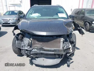2017 Chevrolet Traverse LS z VIN 1GNKRFED1HJ154839, wystawiony jako IAAI lot #42304339 z przebiegiem Nie podano mil oraz . Historia ofert i sprzedaży dostępna na DreamBid. Obrazek 11.