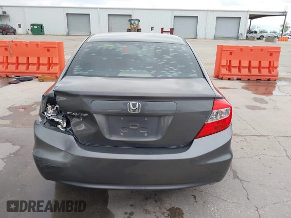 2012 Honda Civic LX z VIN 2HGFB2F51CH600546, wystawiony jako IAAI lot #41920265 z przebiegiem 196 599 mil mil oraz . Historia ofert i sprzedaży dostępna na DreamBid. Obrazek 16.