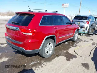 2011 Jeep Grand Cherokee 70th Anniversary with VIN 1J4RR4GT2BC703163, listed as a IAAI auction lot 41763149 with 184,523 mi miles. Bid and sale history available at carsss.com. Image 4.