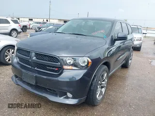2013 Dodge Durango R/T with VIN 1C4SDHCT6DC658802, listed as a IAAI auction lot 42510985 with 67,653 mi miles and . Bid and sale history available at DreamBid. Image 16.