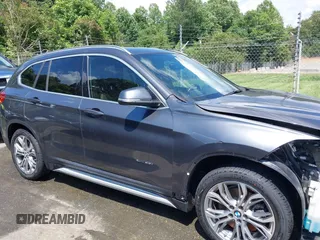 2017 BMW X1 xDrive28i with VIN WBXHT3Z38H4A55086, listed as a IAAI auction lot 42459276 with 101,907 mi miles and . Bid and sale history available at DreamBid. Image 13.