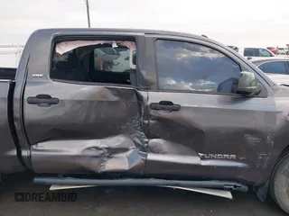 2014 Toyota Tundra SR5 z VIN 5TFEM5F16EX082421, wystawiony jako IAAI lot #40735426 z przebiegiem 173 005 mil mil oraz . Historia ofert i sprzedaży dostępna na DreamBid. Obrazek 17.