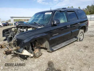 2002 Cadillac Escalade z VIN 1GYEK63N12R141193, wystawiony jako Copart lot #45469095 z przebiegiem Nie podano mil oraz Szkoda całkowita • Salvage title. Historia ofert i sprzedaży dostępna na DreamBid. Obrazek 1.