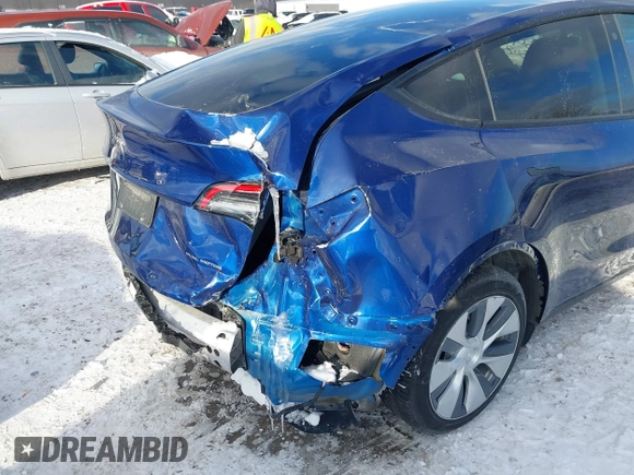 2021 Tesla Model Y Long Range with VIN 5YJYGDEE1MF083780, listed as a IAAI auction lot 41549308 with 37,372 mi miles and . Bid and sale history available at DreamBid. Image 6.