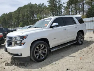 2017 Chevrolet Tahoe Premier with VIN 1GNSCCKC0HR343513, listed as a Copart auction lot 54151445 with 124,762 mi miles and Salvage title. Bid and sale history available at DreamBid. Image 1.