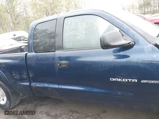 2002 Dodge Dakota Sport with VIN 1B7GL32X12S561414, listed as a IAAI auction lot 42060300 with 235,957 mi miles. Bid and sale history available at carsss.com. Image 13.