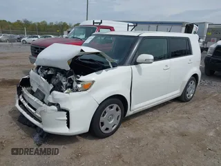 2012 Scion xB with VIN JTLZE4FE4CJ004977, listed as a IAAI auction lot 42116864 with 119,206 mi miles. Bid and sale history available at carsss.com. Image 2.