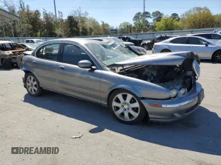 2004 Jaguar X-Type with VIN SAJEA51C04WD91344, listed as a Copart auction lot 49979285 with Not Provided miles and Salvage Title. Bid and sale history available at DreamBid. Image 4.