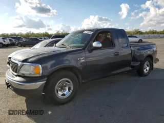 2000 Ford F-150 with VIN 1FTRX07W3YKA56561, listed as a Copart auction lot 81149654 with 185,967 mi miles and Salvage title. Bid and sale history available at DreamBid. Image 1.