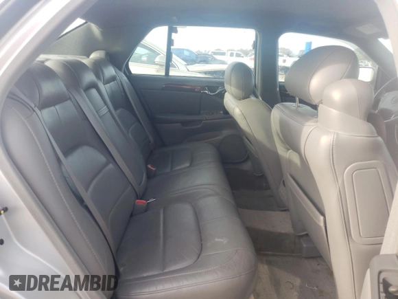 2003 Cadillac DeVille DTS z VIN 1G6KF57973U163124, wystawiony jako Copart lot #78054584 z przebiegiem 111 189 mil mil oraz Szkoda całkowita • Salvage title. Historia ofert i sprzedaży dostępna na DreamBid. Obrazek 10.