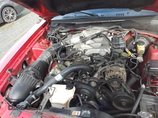 2004 Ford Mustang Deluxe with VIN 1FAFP44654F162713, listed as a IAAI auction lot 41525265 with 213,365 mi miles. Bid and sale history available at carsss.com. Image 10.