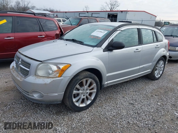 2011 Dodge Caliber Heat with VIN 1B3CB5HA0BD237473, listed as a IAAI auction lot 41690622 with 205,961 mi miles and . Bid and sale history available at DreamBid. Image 2.