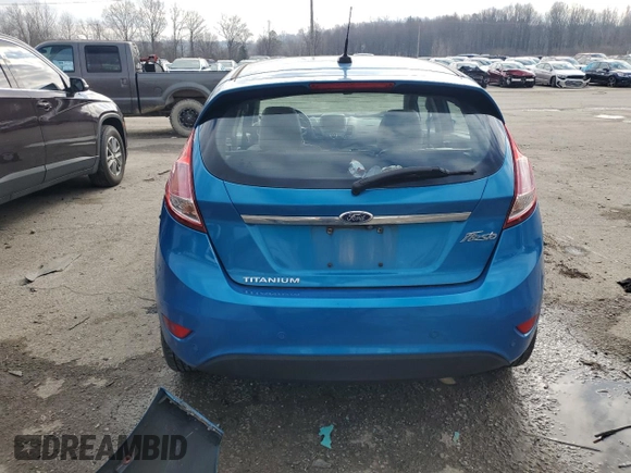 2015 Ford Fiesta Titanium z VIN 3FADP4FJ7FM120958, wystawiony jako Copart lot #85260204 z przebiegiem 144 587 mil mil oraz Szkoda całkowita • Salvage title. Historia ofert i sprzedaży dostępna na DreamBid. Obrazek 6.