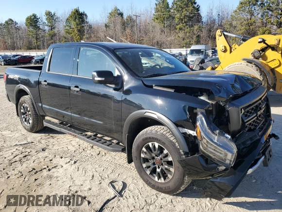 2024 Nissan Titan Pro-4X with VIN 1N6AA1ED6RN111104, listed as a Copart auction lot 46129425 with 4,903 mi miles and Salvage title. Bid and sale history available at DreamBid. Image 4.