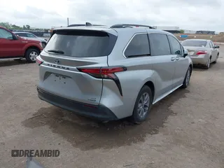 2021 Toyota Sienna XLE with VIN 5TDYRKEC9MS041334, listed as a IAAI auction lot 42145698 with 117,229 mi miles and . Bid and sale history available at DreamBid. Image 4.