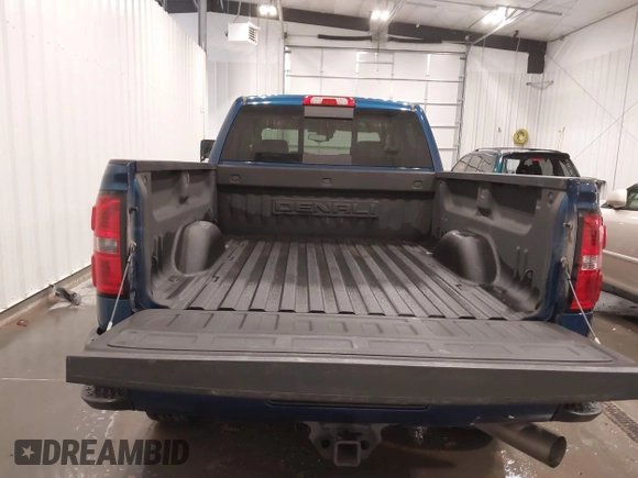 2015 GMC Sierra 2500HD Denali z VIN 1GT120E86FF655301, wystawiony jako IAAI lot #41965001 z przebiegiem 74 136 mil mil oraz . Historia ofert i sprzedaży dostępna na DreamBid. Obrazek 18.