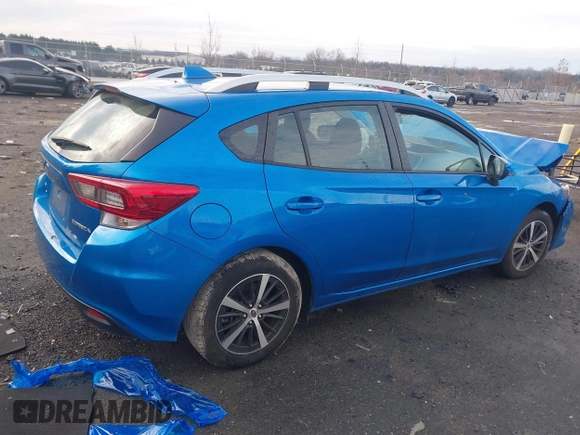 2023 Subaru Impreza Premium with VIN 4S3GTAD62P3700119, listed as a IAAI auction lot 41180070 with 20,853 mi miles and . Bid and sale history available at DreamBid. Image 4.