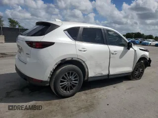 2019 Mazda CX-5 Touring with VIN JM3KFACM5K0693931, listed as a Copart auction lot 51599685 with 51,907 mi miles and Non Repairable. Bid and sale history available at carsss.com. Image 3.
