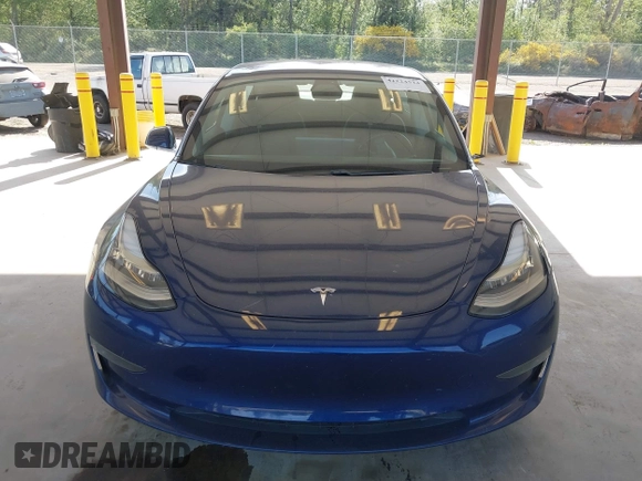 2018 Tesla Model 3 Long Range Battery z VIN 5YJ3E1EA6JF041970, wystawiony jako IAAI lot #42224514 z przebiegiem 79 744 mil mil oraz . Historia ofert i sprzedaży dostępna na DreamBid. Obrazek 12.