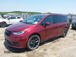 2023 Chrysler Pacifica Touring L with VIN 2C4RC1BG7PR513017, listed as a IAAI auction lot 42441272 with 23,310 mi miles and . Bid and sale history available at DreamBid. Image 17.